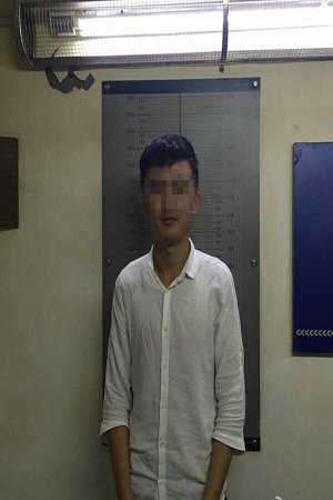 警方公布的胡某被捕后照片。图由杭州警方发布