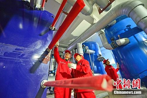资料图：供暖。中新社发 仝江 摄